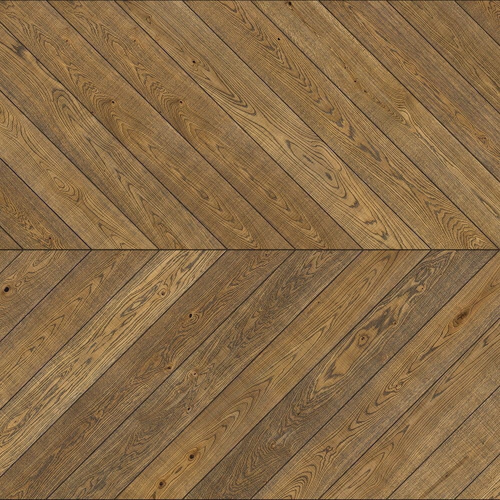 Zbliżenie drewnianej podłogi ze wzorem w jodełkę przedstawiającym Dąb Aromatyczny.