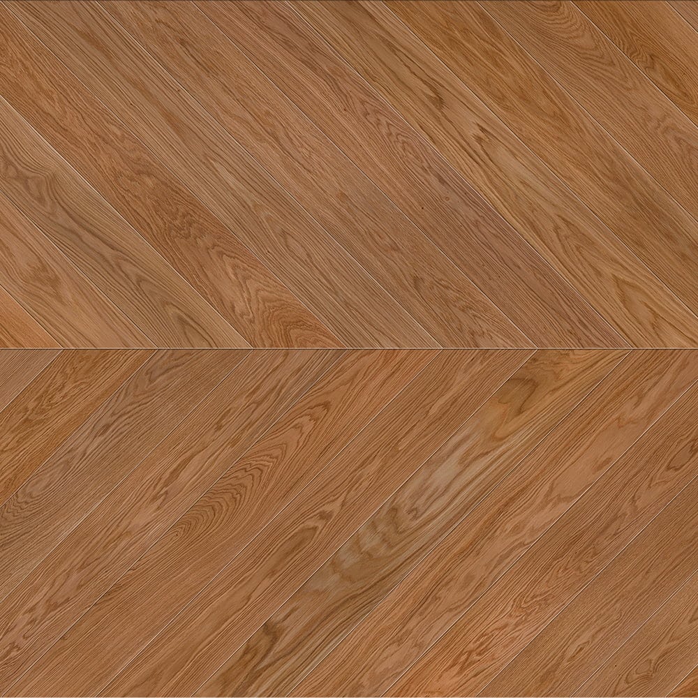 Zbliżenie drewnianej podłogi ze wzorem w jodełkę w Dąbie Karmelowym lub Orzechu.