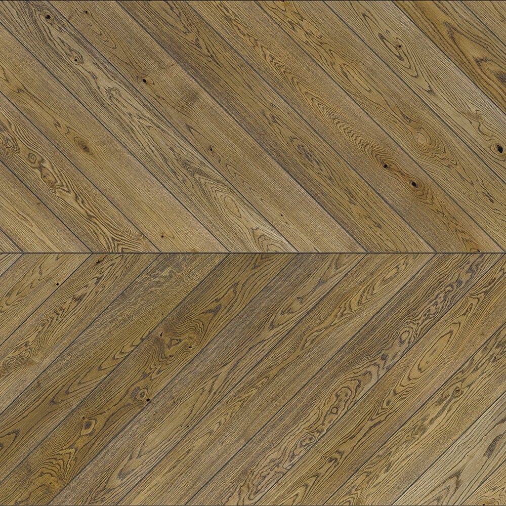 Zbliżenie na drewnianą podłogę ze wzorem jodełki inspirowanym projektem Jodełki Francuskiej.