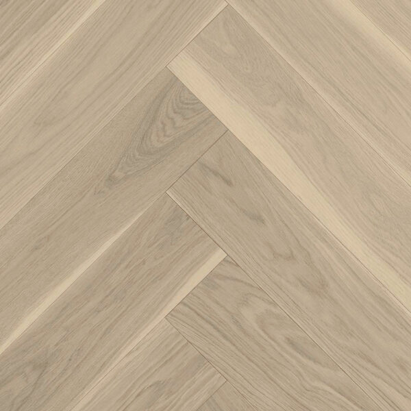 Zbliżenie na białą podłogę drewnianą w jodełkę wykonaną z Dąbu Ticino.